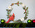 Cardinal on Holly Wreath